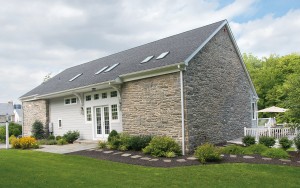 Natural light fills the interior space of the one-time barn thanks to skylights, French doors and windows of various sizes.