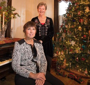 Dawn Fisher (seated) and Jeanne Fisher collaborated on decorating Jeanne’s home for last year’s Columbia Victorian Christmas Tour. An interesting tidbit: In the Victorian era, shopkeepers attracted business by rewarding customers who purchased items with free candles. 